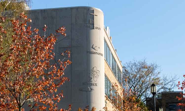 Exterior photo of Canisius Hall in Fall.  Home to the Meditz College of Arts & Sciences offices.