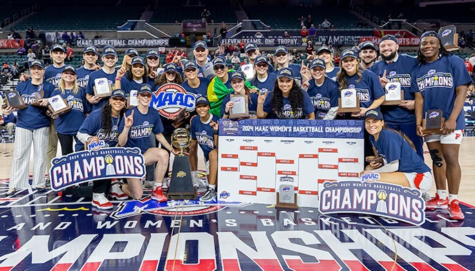 The Fairfield Women's basketball team proudly poses with their trophy, showcasing their achievements and team spirit. 