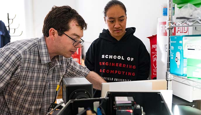 David Shekhtman, PhD and engineering student working on project in lab 