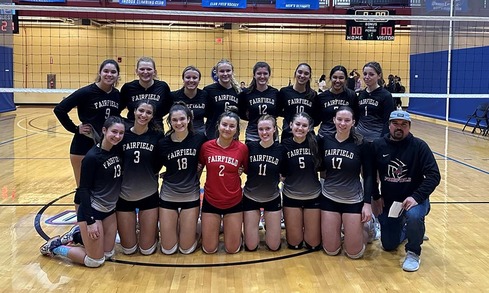Women's Volleyball club team group shot, inside on court.