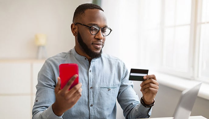 Person online shopping after using two-factor authentication for increased log-in security. 