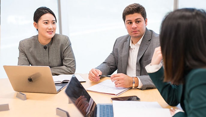 Fairfield MBA students participate in a discussion during a business class.