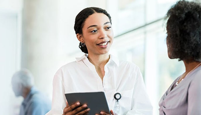 A medical records technician gaining field experience required to become a healthcare administrator.